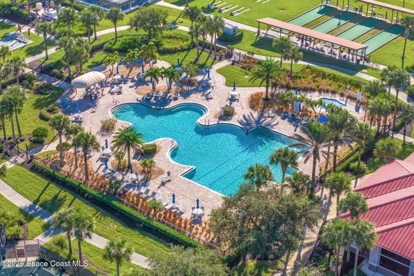 a view of swimming pool with a yard
