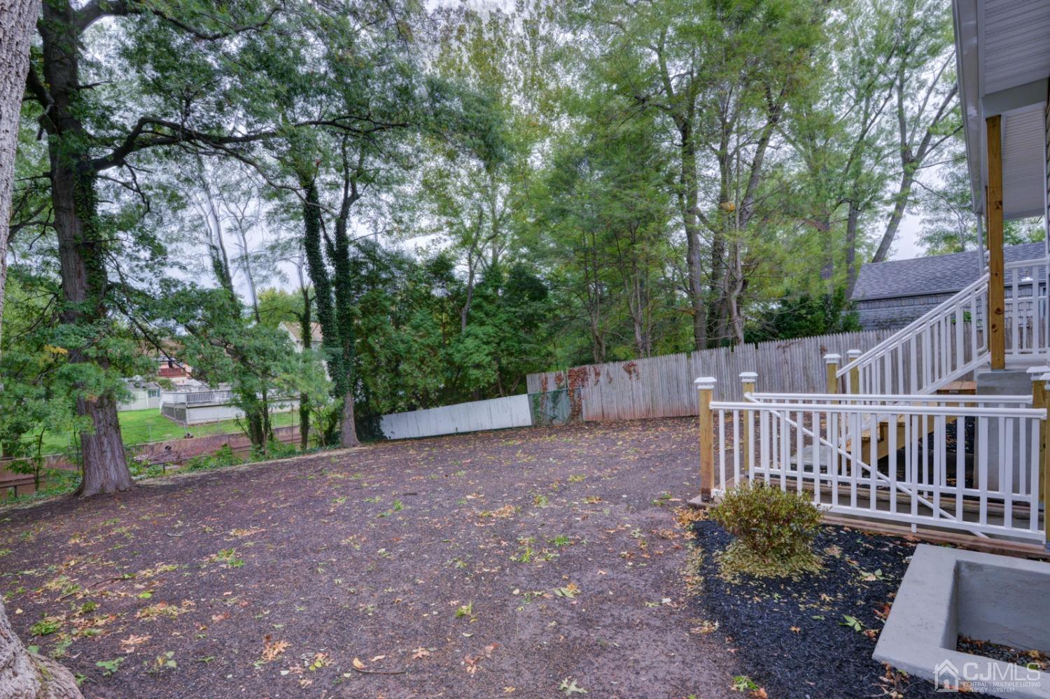 420 Chain O' Hills Road Colonia, NJ 07067 - Photo 30 of 37 a view of a deck with a backyard