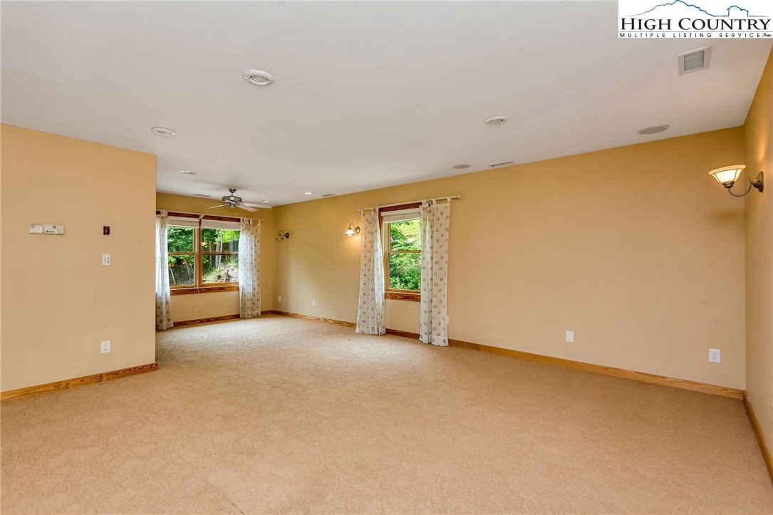 453 South River Hills Road Lansing, NC 28643 - Photo 30 of 48 a view of an empty room with a window