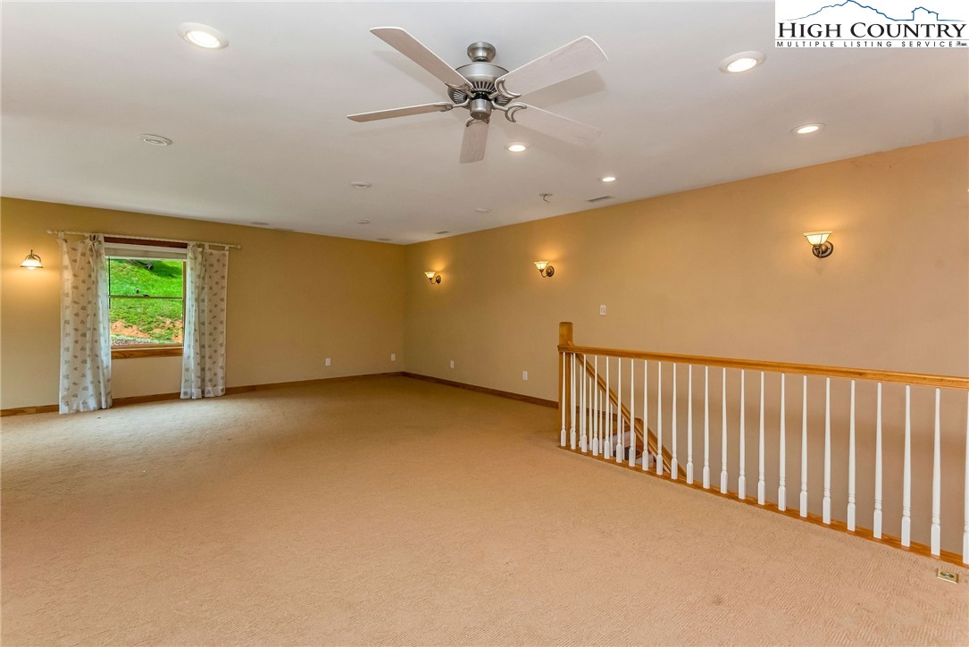 453 South River Hills Road Lansing, NC 28643 - Photo 34 of 48 a view of an empty room with a window
