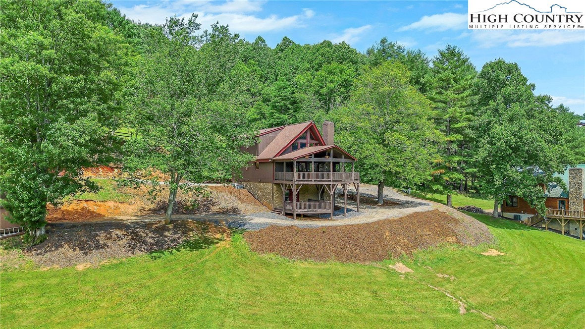 453 South River Hills Road Lansing, NC 28643 - Photo 4 of 48 a view of a park with iron fence