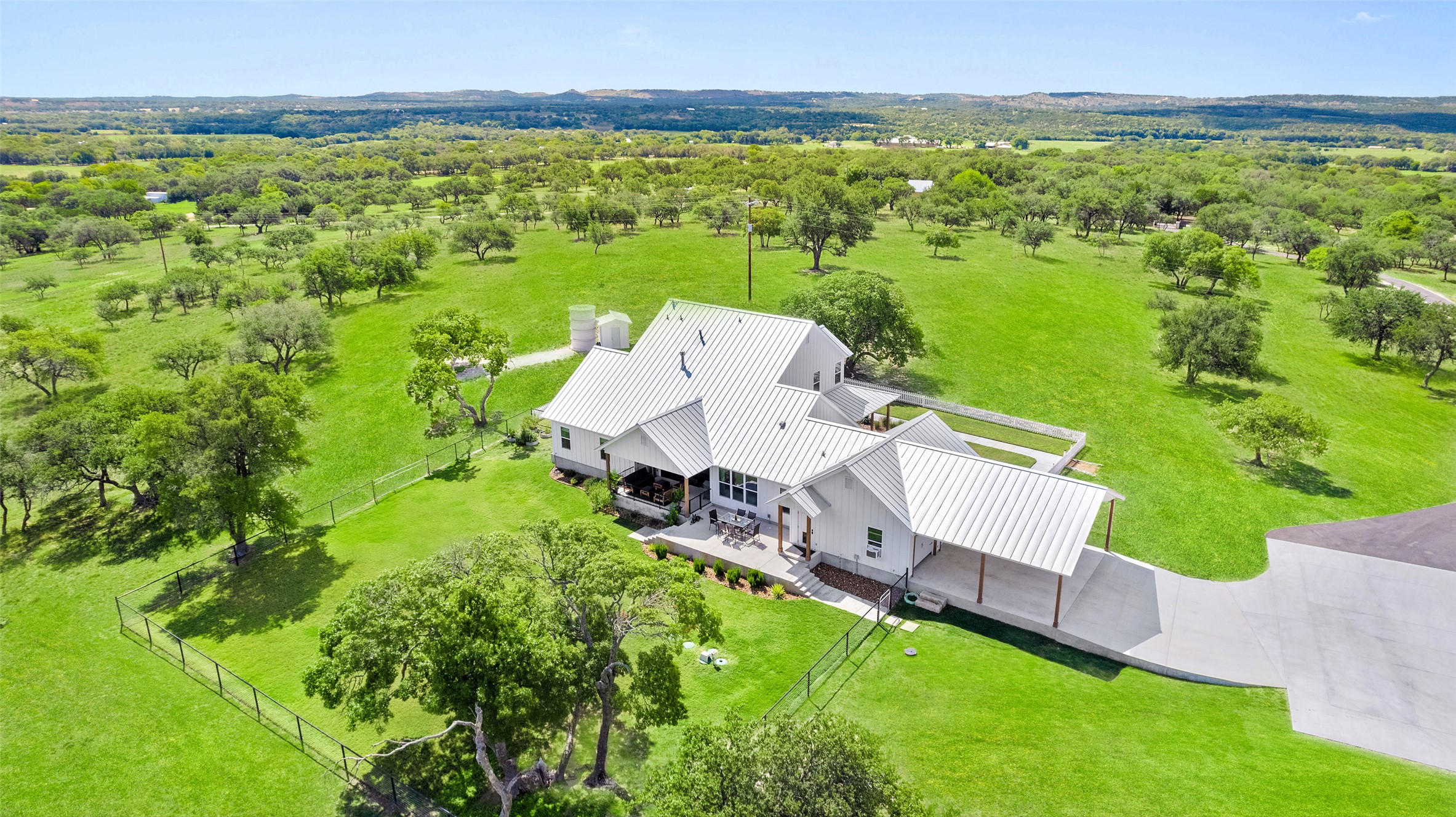 2454 McKinney Loop Blanco, TX 78606 - Photo 11 of 21 an aerial view of a house with pool garden and ocean view