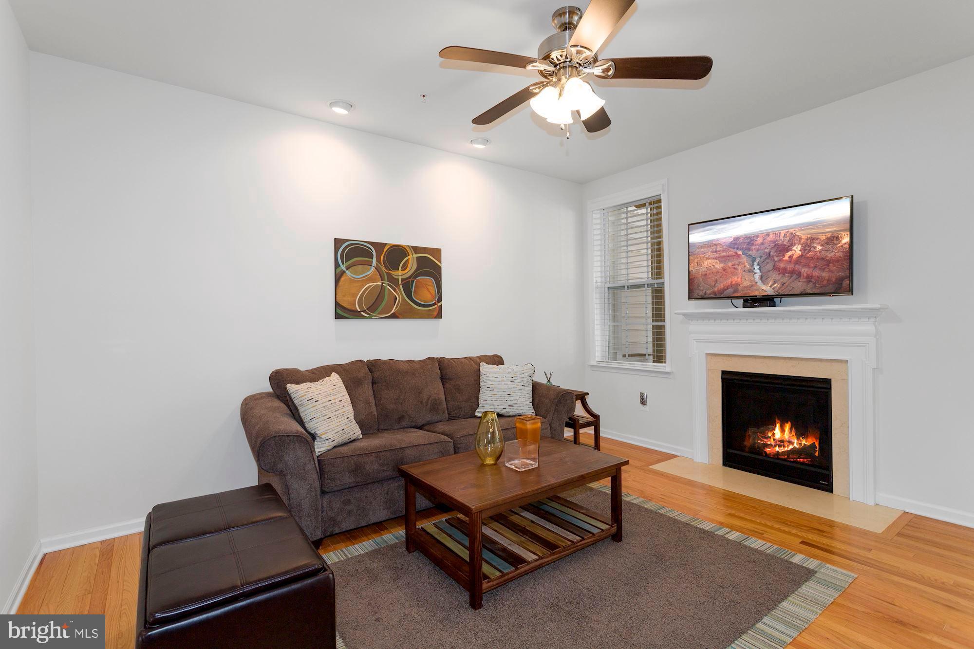 4049 Ranch Road Upper Marlboro, MD 20772 - Photo 8 of 43 living area with gas fireplace