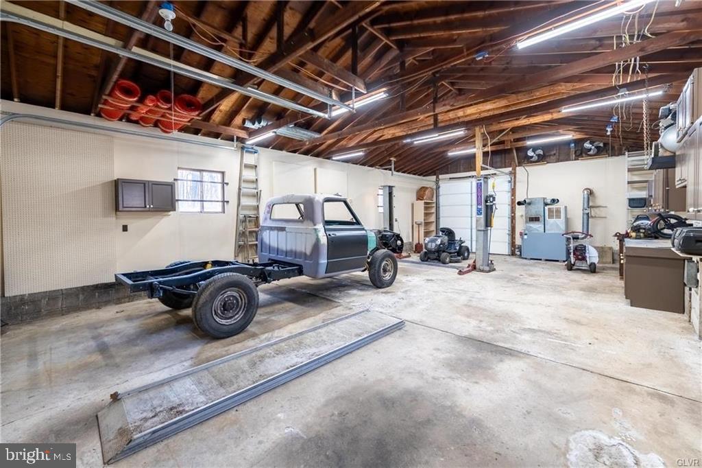 4835 Shimerville Road Emmaus, PA 18049 - Photo 14 of 16 a view of a garage with cars