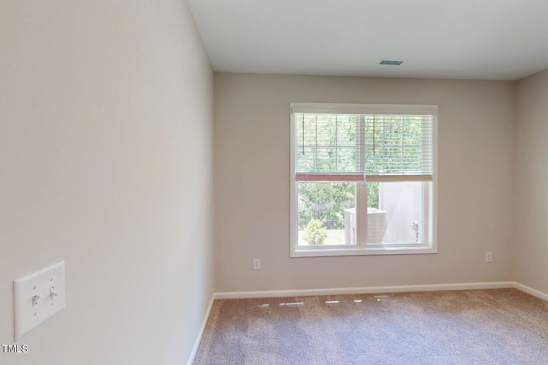 2209 Lambert Road Cary, NC 27519 - Photo 19 of 51 an empty room with a window