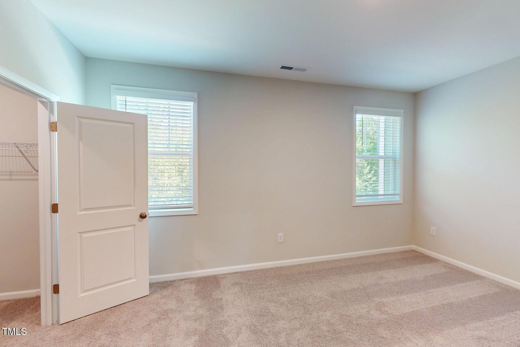 2209 Lambert Road Cary, NC 27519 - Photo 22 of 51 an empty room with windows