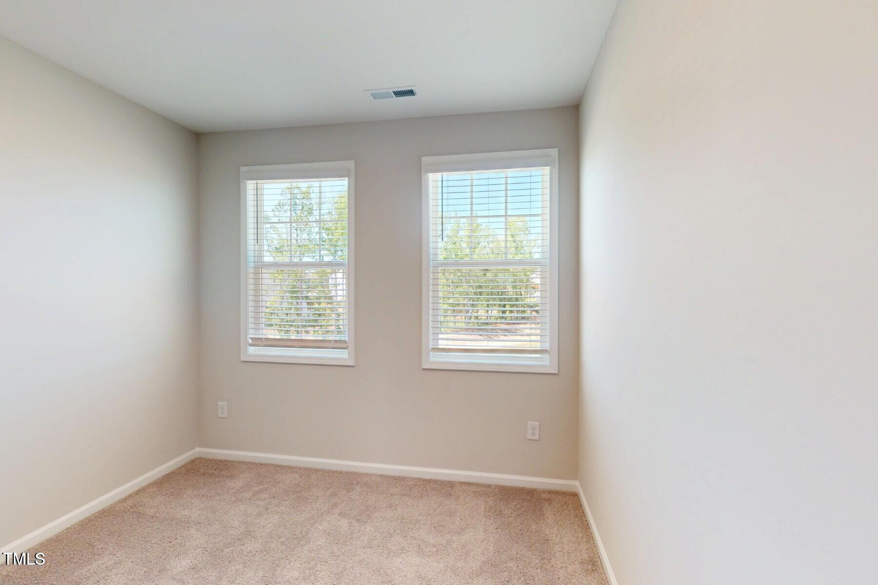 2209 Lambert Road Cary, NC 27519 - Photo 38 of 51 an empty room with a window