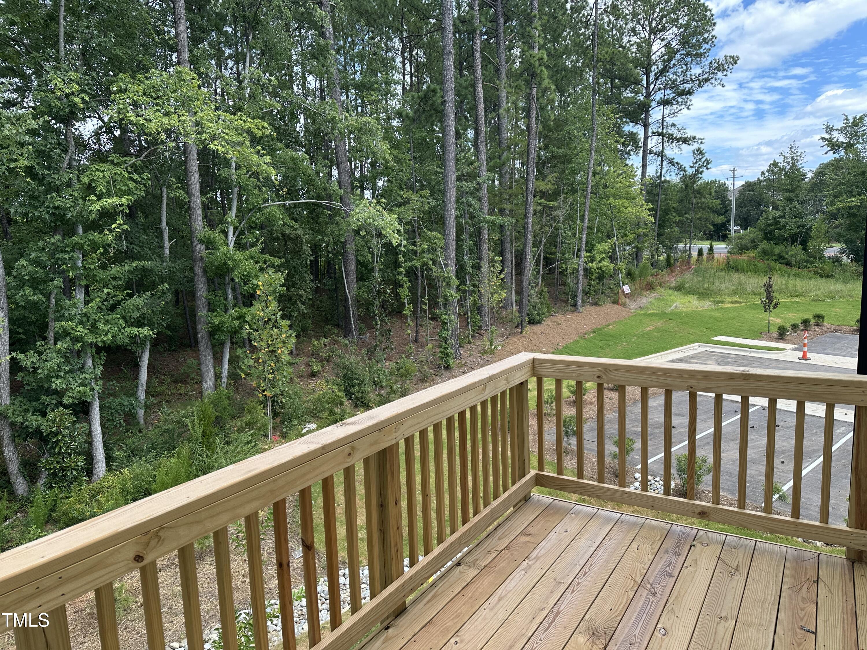 2209 Lambert Road Cary, NC 27519 - Photo 42 of 51 a balcony with wooden floor and fence