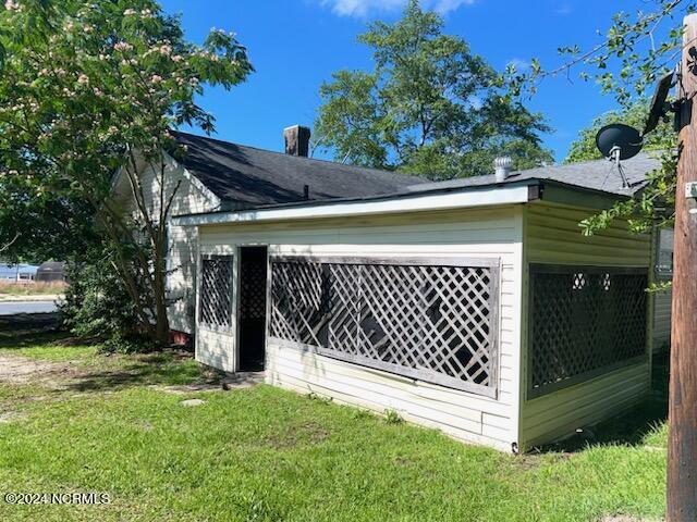 174 Mill Street Rockingham, NC 28379 - Photo 5 of 25 174 Mill St-outside screened porch pt 2