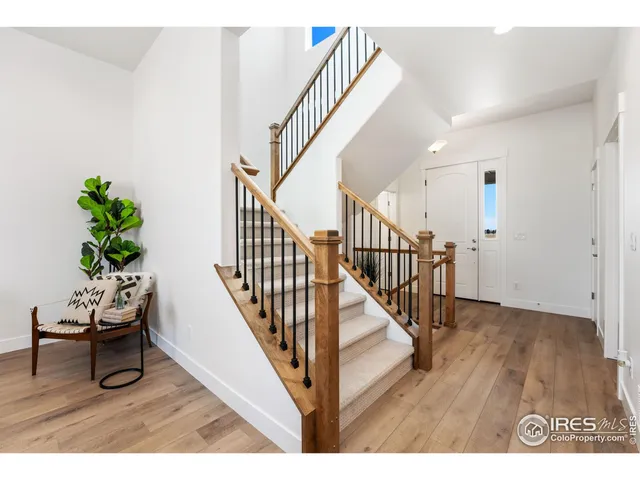 a view of entryway with wooden floor