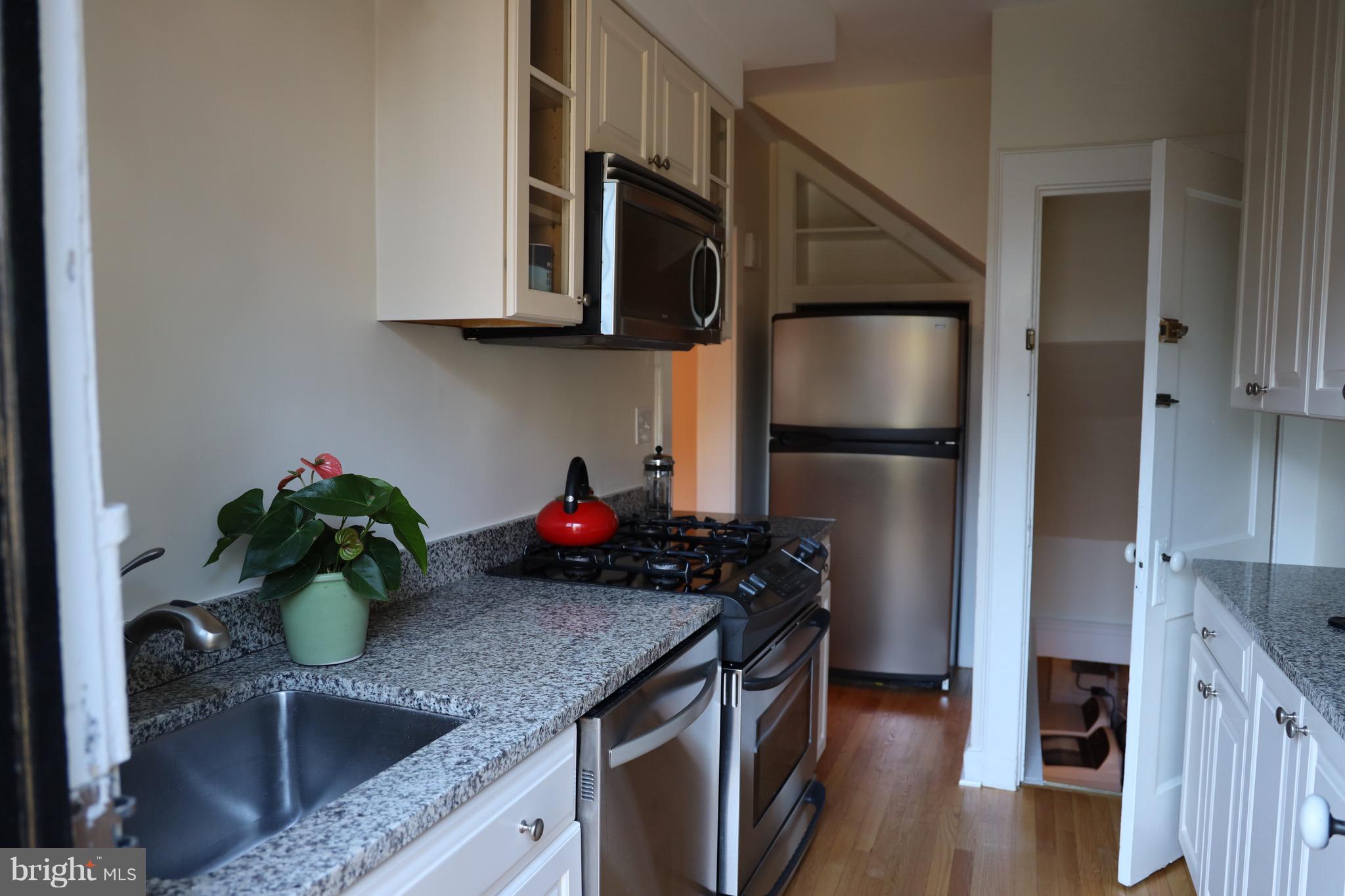 4436 Reservoir Road Northwest Washington, DC 20007 - Photo 11 of 28 Kitchen, and access to basement