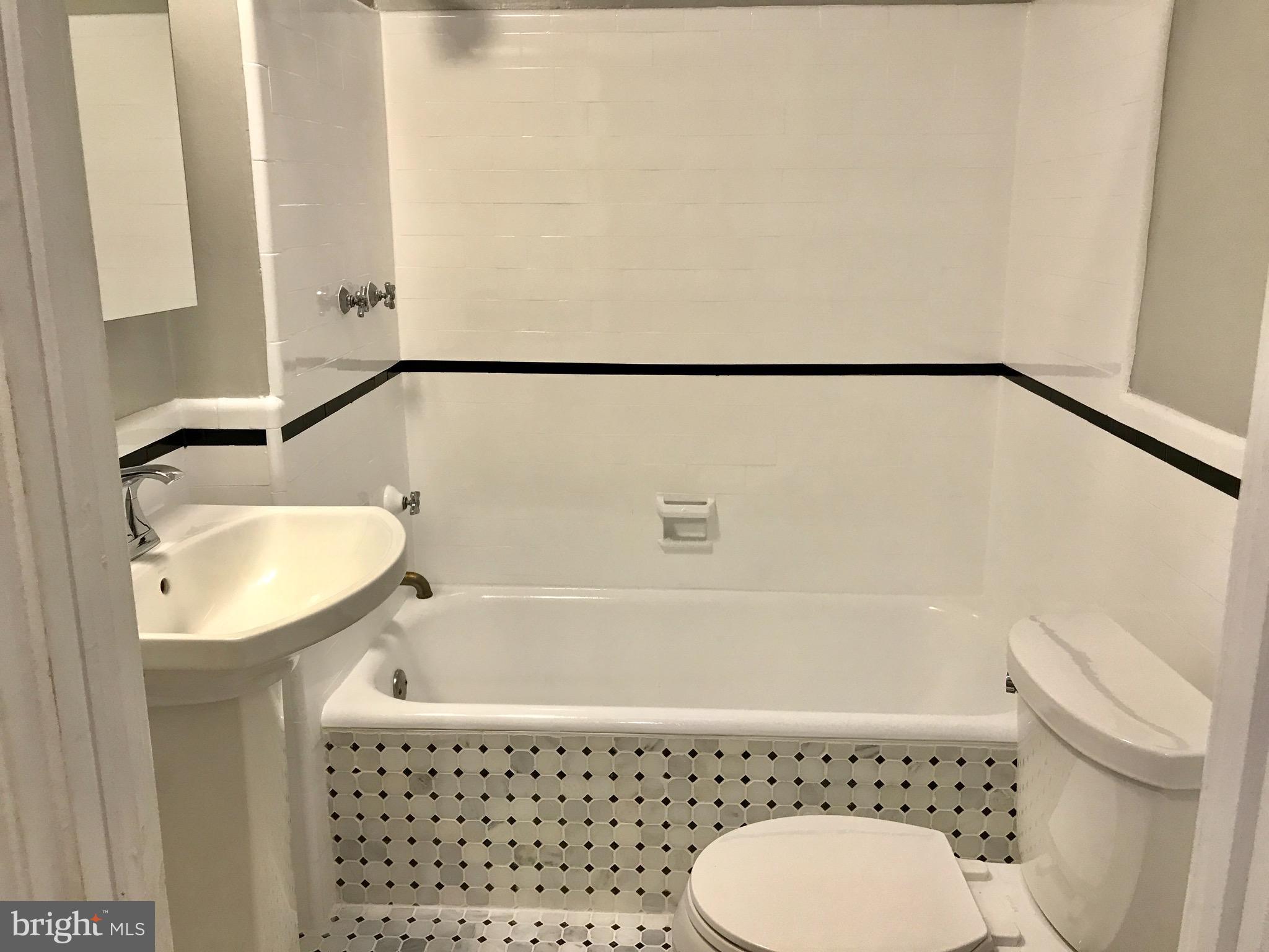4436 Reservoir Road Northwest Washington, DC 20007 - Photo 17 of 28 Newly renovated marble and ceramic tile