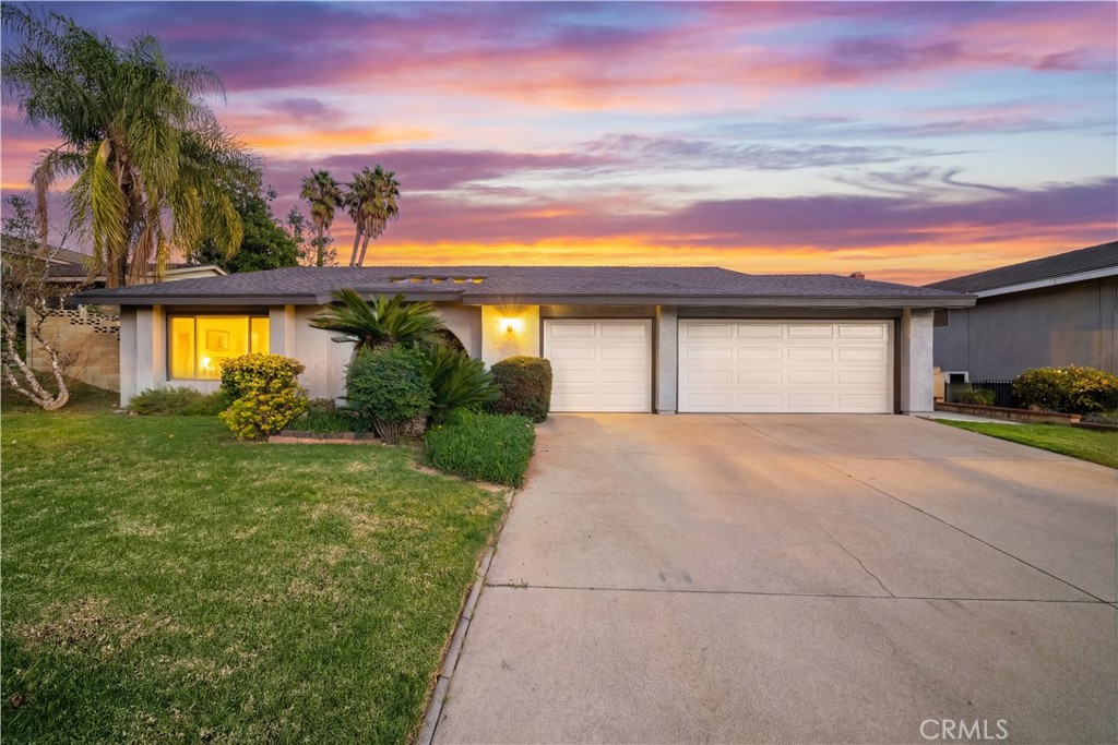 a house view with a garden space
