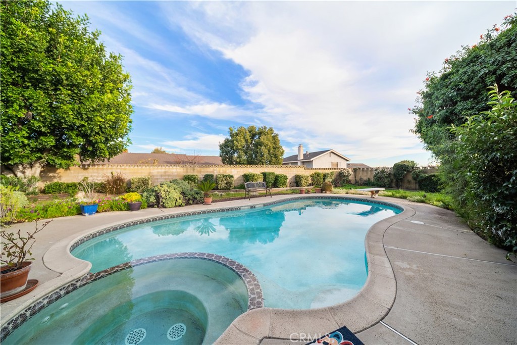 6275 Sapphire Street Rancho Cucamonga, CA 91701 - Photo 16 of 32 a view of swimming pool with a yard