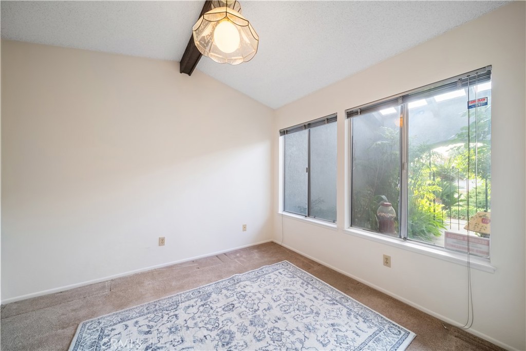 6275 Sapphire Street Rancho Cucamonga, CA 91701 - Photo 19 of 32 a view of an empty room with a window