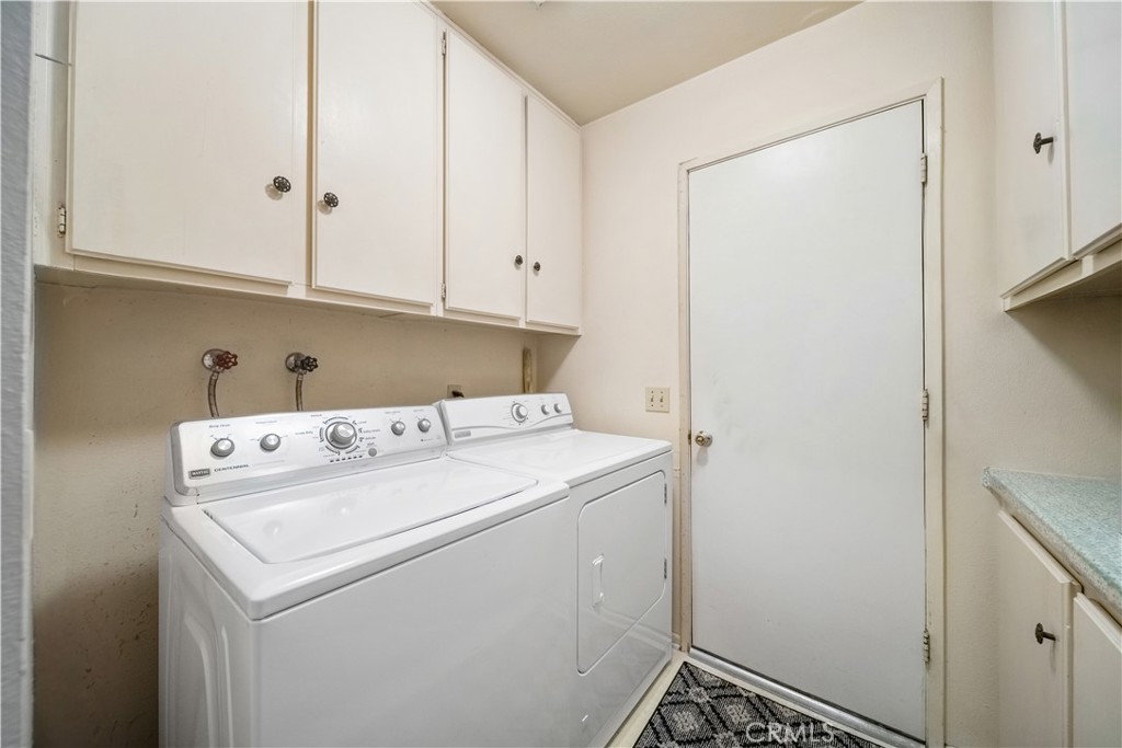 6275 Sapphire Street Rancho Cucamonga, CA 91701 - Photo 29 of 32 a utility room with dryer and washer