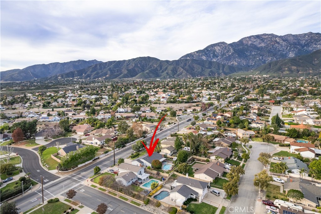 6275 Sapphire Street Rancho Cucamonga, CA 91701 - Photo 32 of 32 an aerial view of residential house and sandy dunes