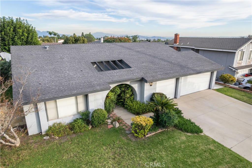 6275 Sapphire Street Rancho Cucamonga, CA 91701 - Photo 4 of 32 an aerial view of a house with yard and outdoor seating