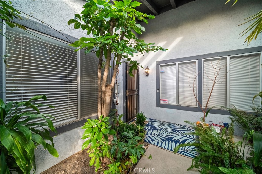 6275 Sapphire Street Rancho Cucamonga, CA 91701 - Photo 7 of 32 a plant sitting in front of a house