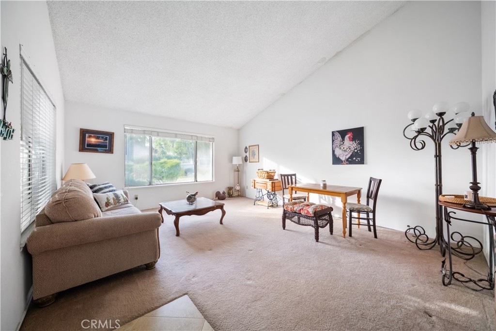 6275 Sapphire Street Rancho Cucamonga, CA 91701 - Photo 8 of 32 a living room with furniture and a window