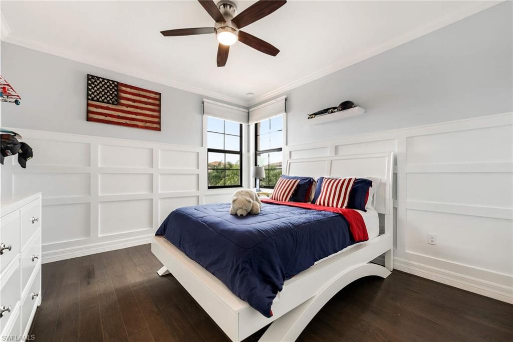 4347 Avalon Court Naples, FL 34119 - Photo 13 of 22 a bedroom with a bed and a window