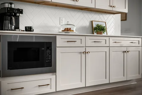 a kitchen with a stove and a sink