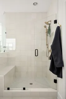 a bedroom with bed and a window