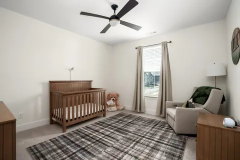 a front view of a house with a swimming pool