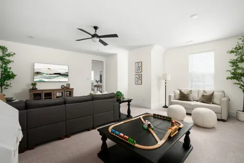 a view of yard with swimming pool and outdoor seating