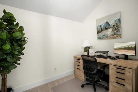 a view of a park with swings