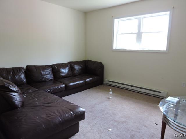 2 Gum Road Effort, PA 18330 - Photo 6 of 8 a living room with a couch and a window