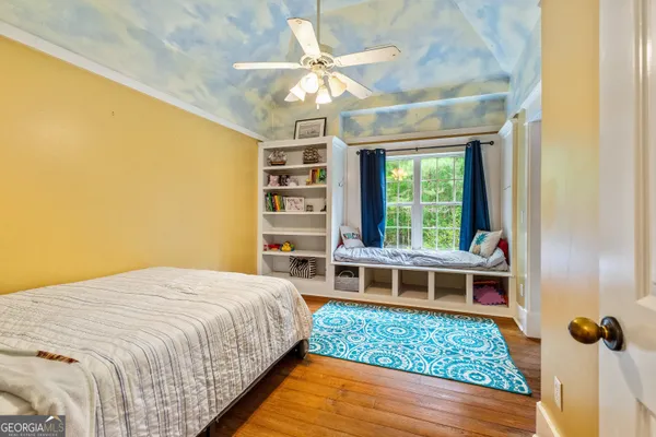 a very nice looking room with a dining table chairs
