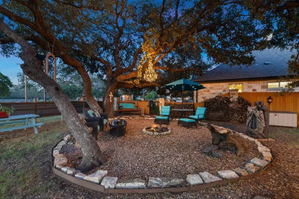 a view of a slide with a tree