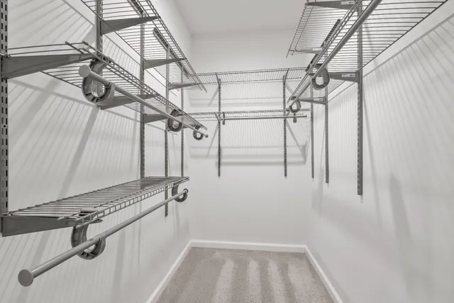 a view of a room with racks on the wall