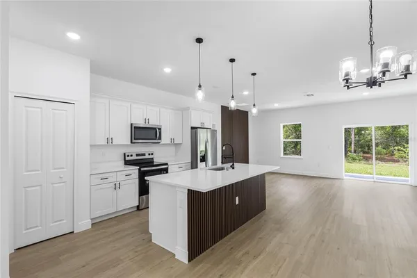 a workspace with furniture and window