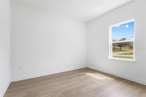 a kitchen with kitchen island a sink stainless steel appliances and cabinets