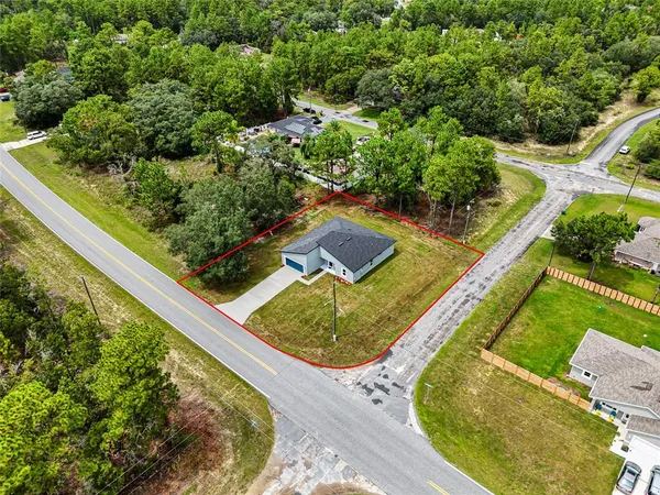 an aerial view of a backyard
