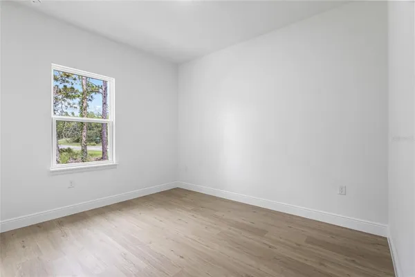 a view of a bathroom from a hallway