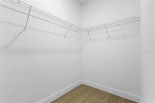 a bathroom with a tub and shower