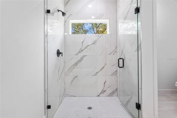 a view of a house with a backyard space