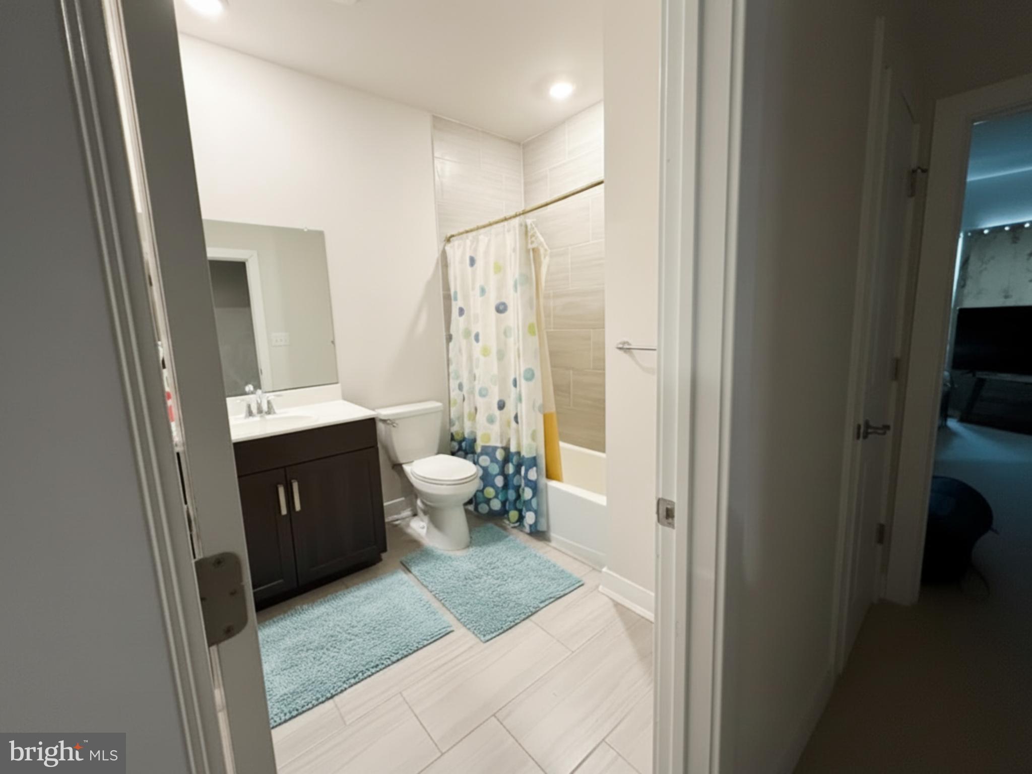 16 Lochiel Lane Exton, PA 19341 - Photo 17 of 19 a spacious bathroom with a double vanity sink a mirror and a shower