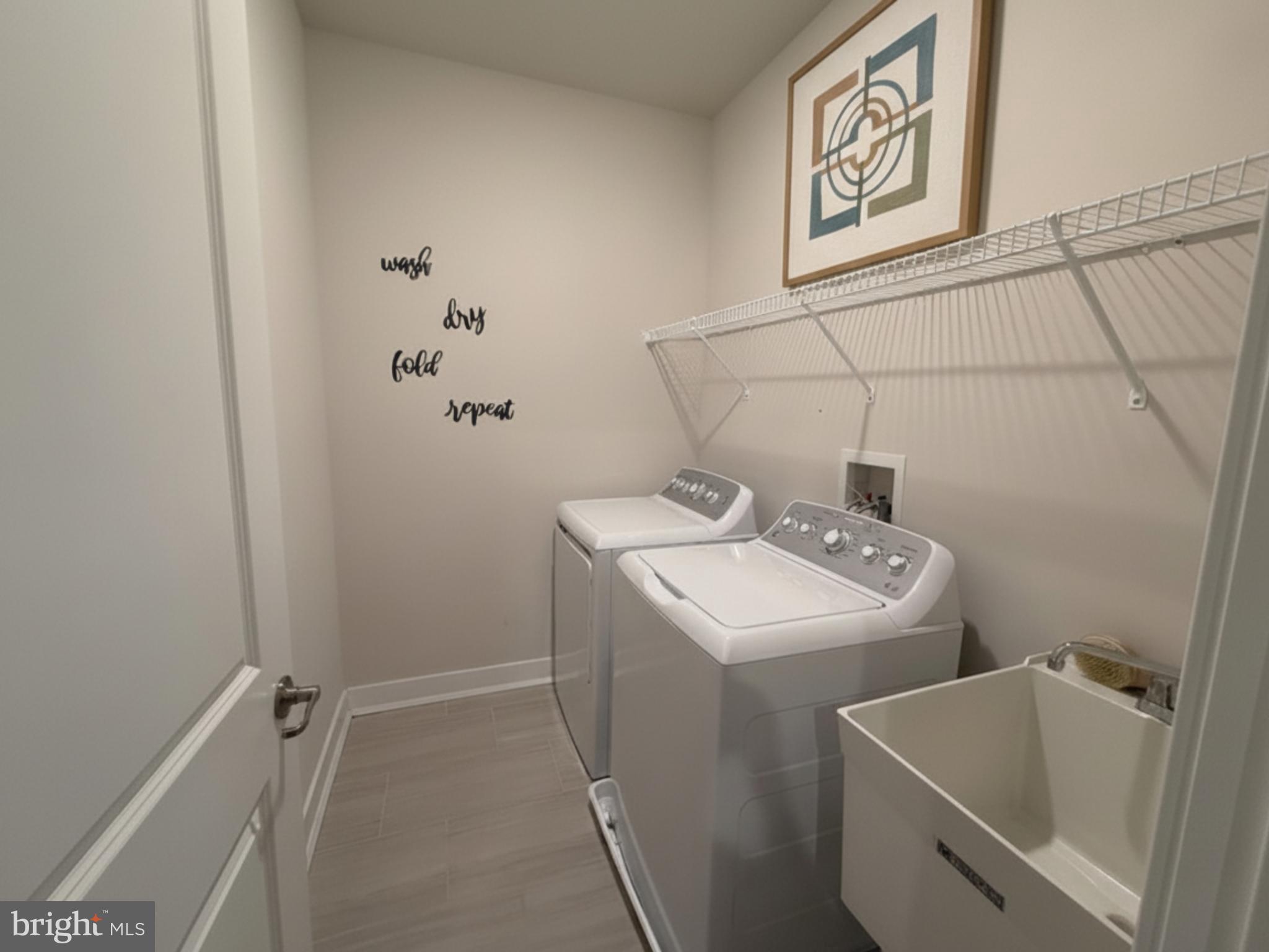 16 Lochiel Lane Exton, PA 19341 - Photo 18 of 19 a utility room with dryer and washer