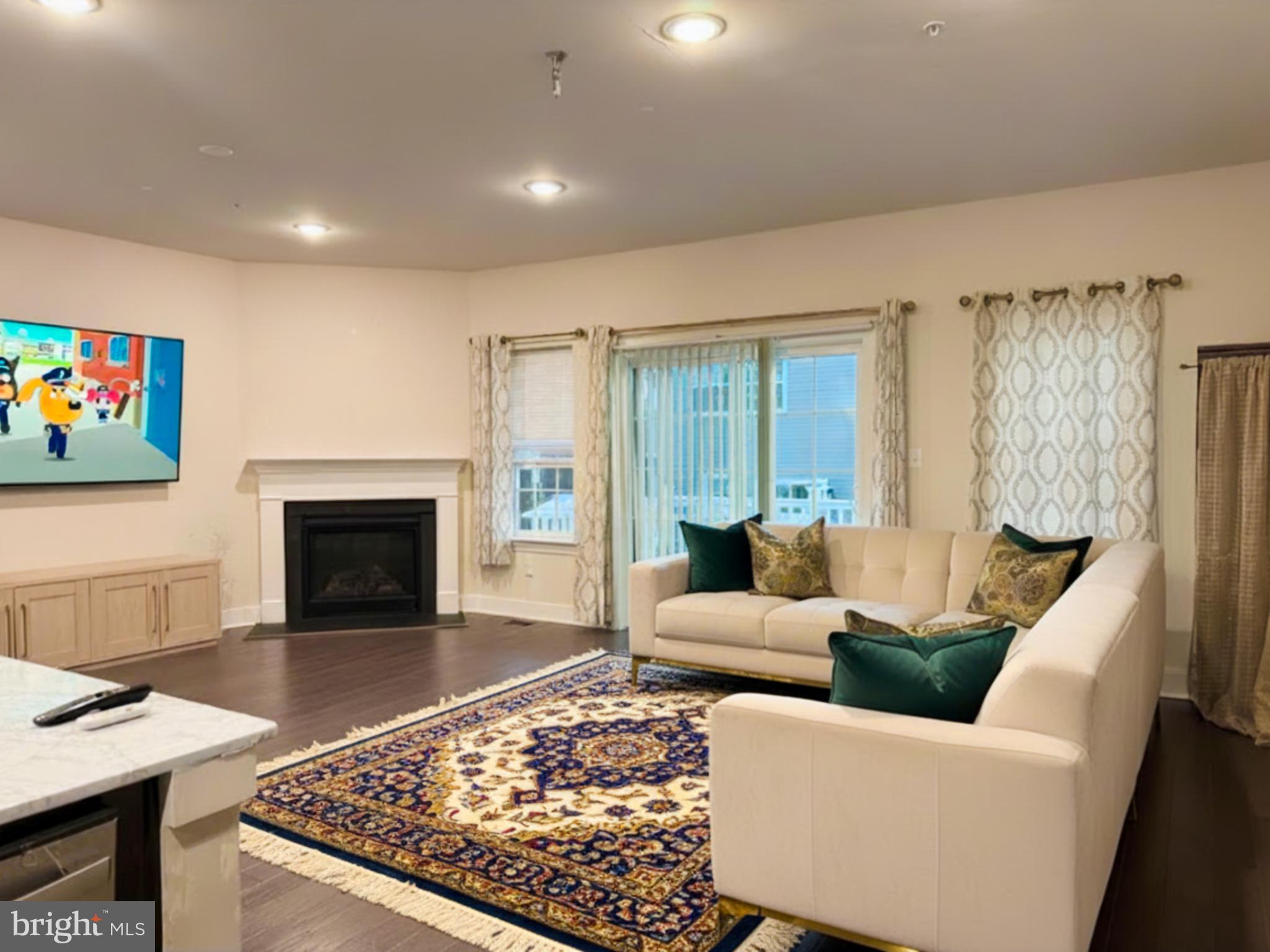 16 Lochiel Lane Exton, PA 19341 - Photo 6 of 19 a living room with furniture and a fireplace