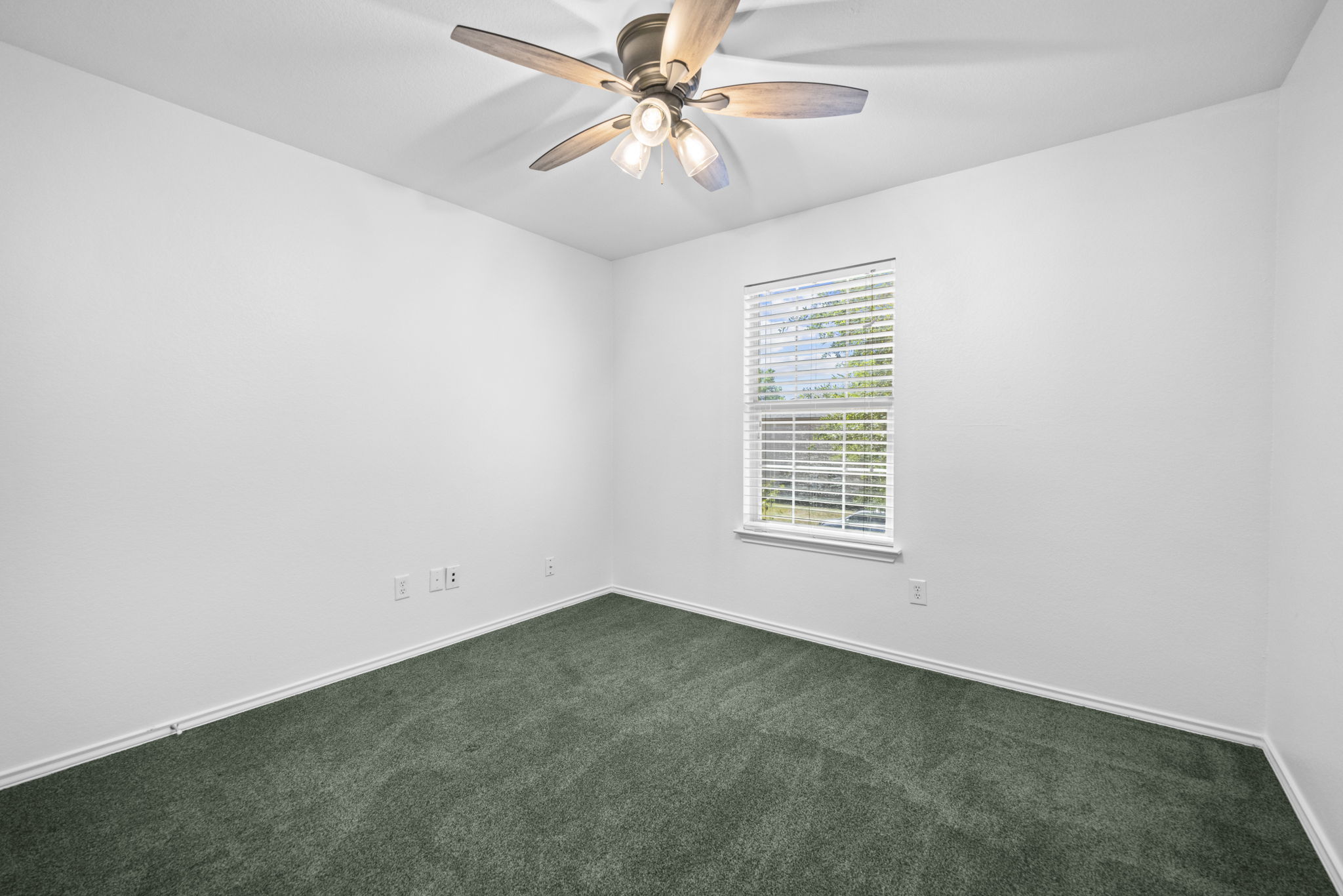 89 Jan Lane Georgetown, TX 78626 - Photo 25 of 29 Unfurnished room with ceiling fan and dark carpet