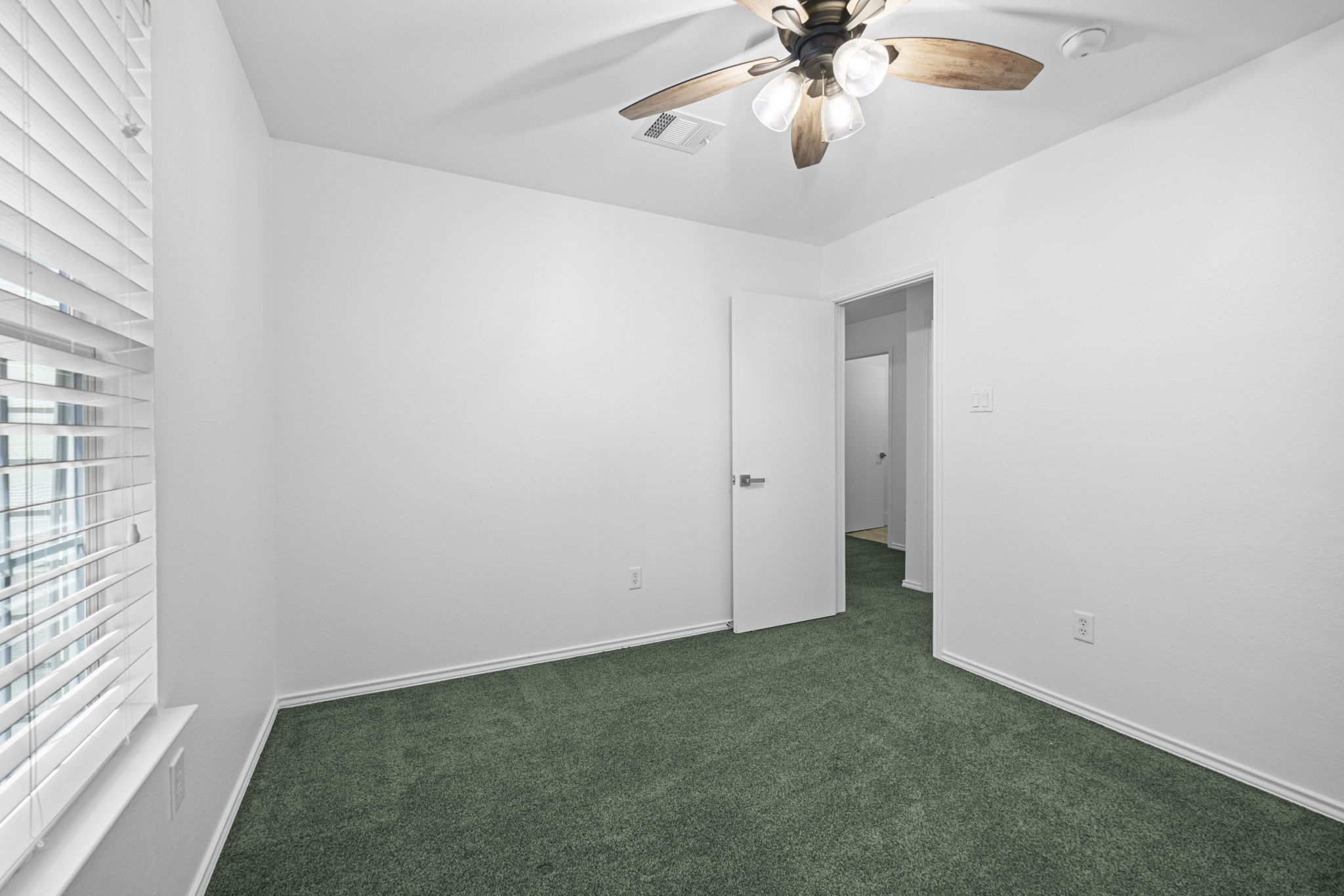89 Jan Lane Georgetown, TX 78626 - Photo 26 of 29 Unfurnished room with a ceiling fan and dark carpet