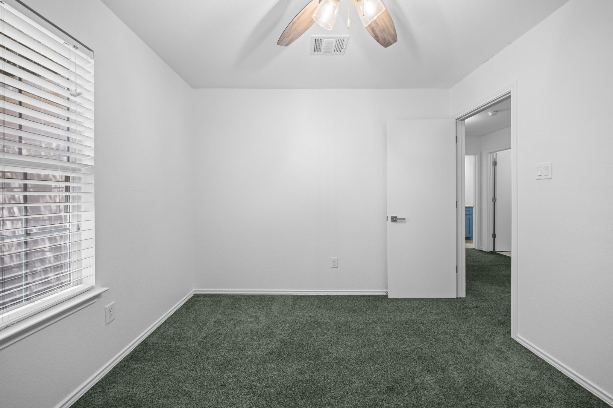 89 Jan Lane Georgetown, TX 78626 - Photo 27 of 29 Empty room featuring ceiling fan and dark carpet