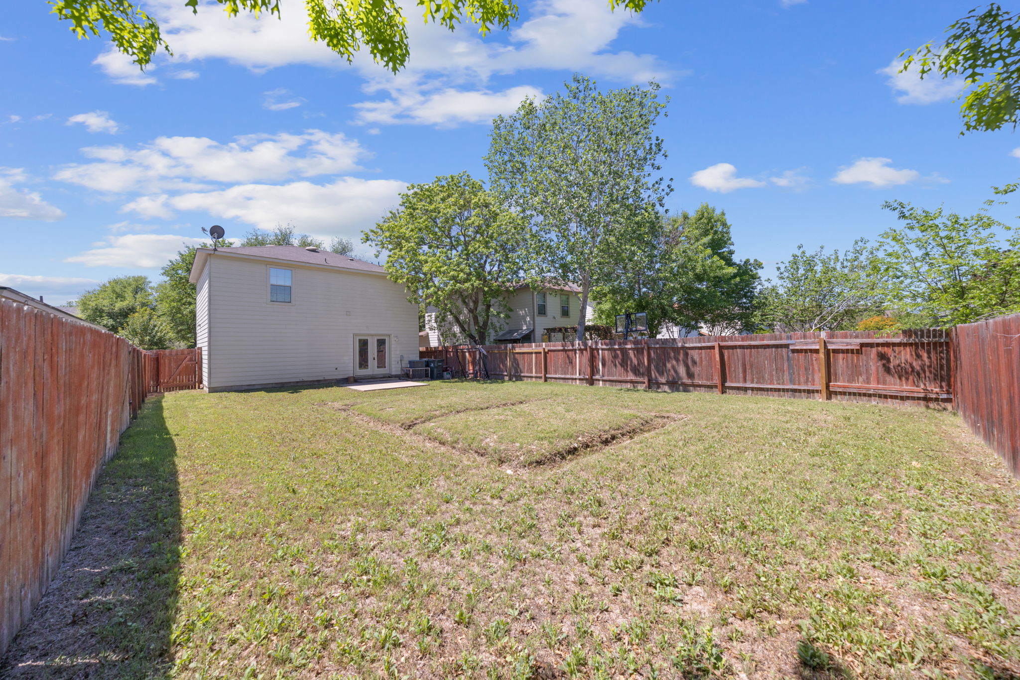 89 Jan Lane Georgetown, TX 78626 - Photo 29 of 29 Fenced backyard featuring a patio area and french doors