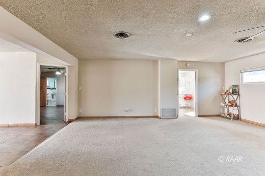 120 South Silver Ridge Street Ridgecrest, CA 93555 - Photo 24 of 35 an empty room with window and a projector