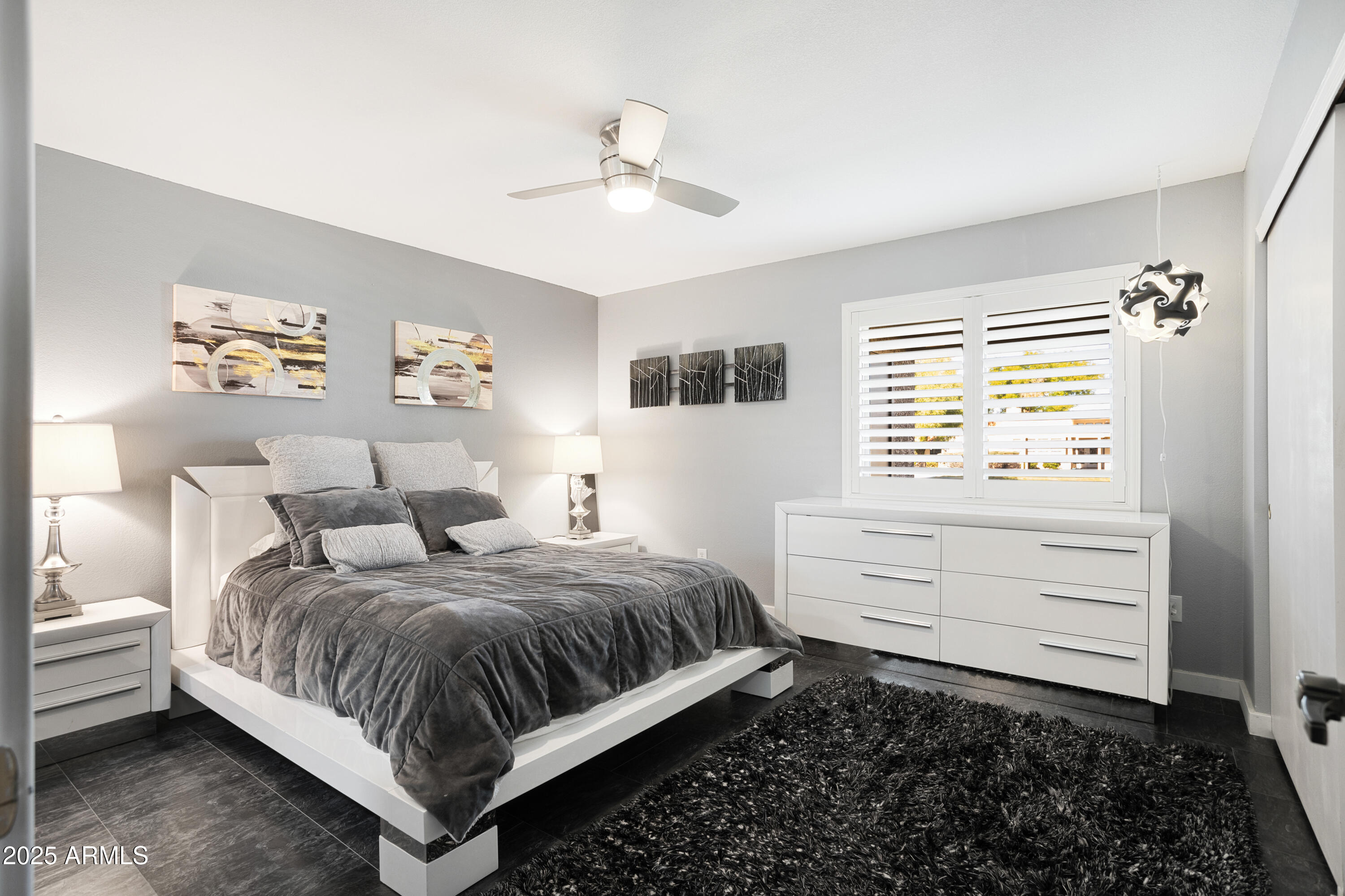 1021 South Greenfield Road, Unit 1195 Mesa, AZ 85206 - Photo 10 of 41 a bedroom with a bed and a window