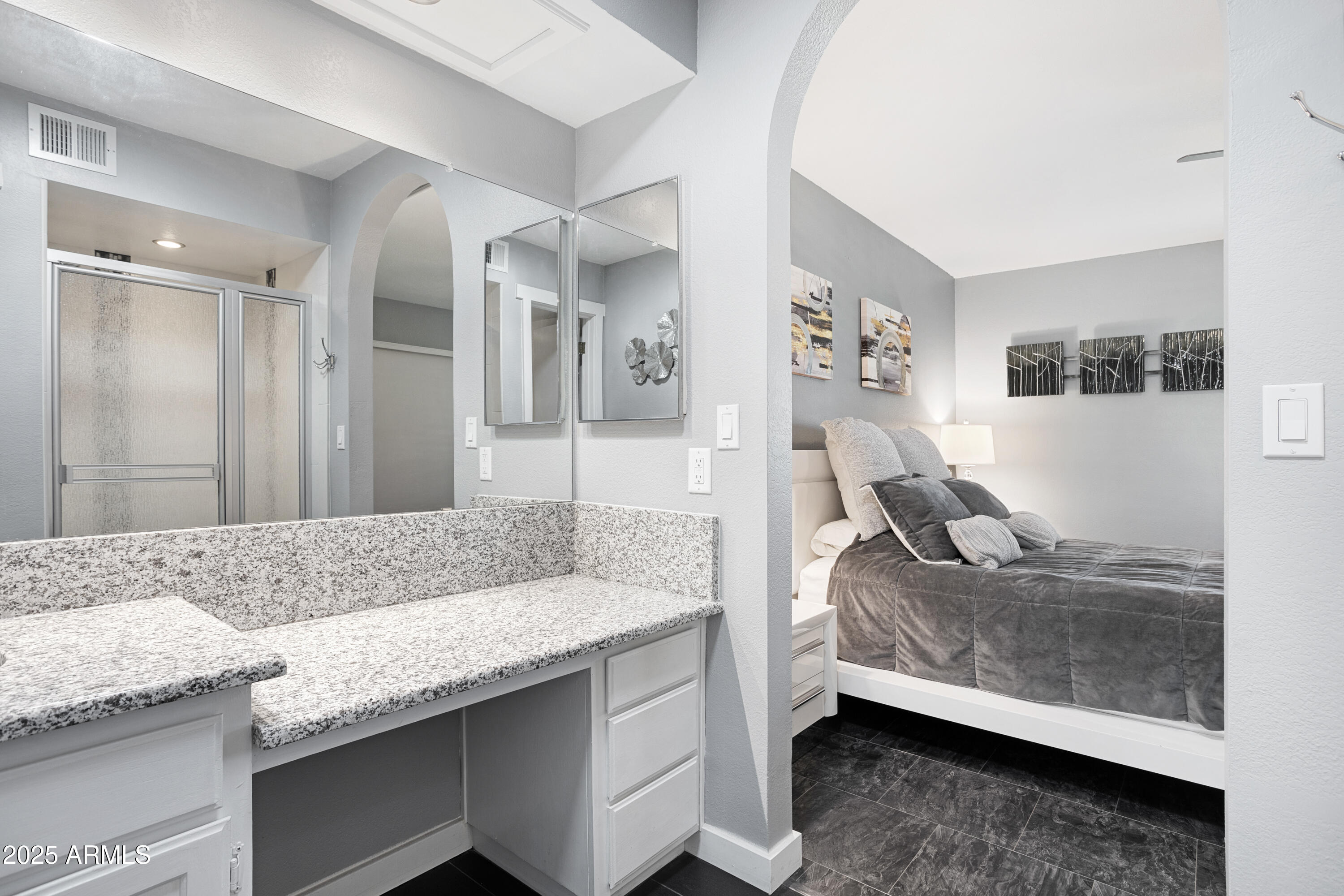 1021 South Greenfield Road, Unit 1195 Mesa, AZ 85206 - Photo 18 of 41 a living room with granite countertop and couch